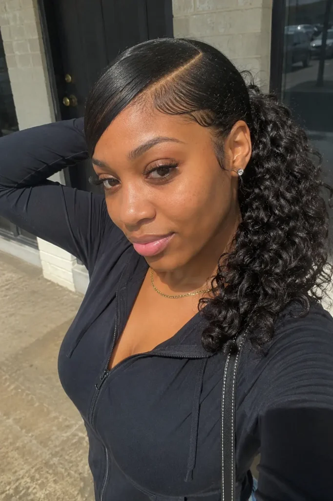 girl with a deep side-part curly quick weave ponytail featuring soft, voluminous curls and natural movement,