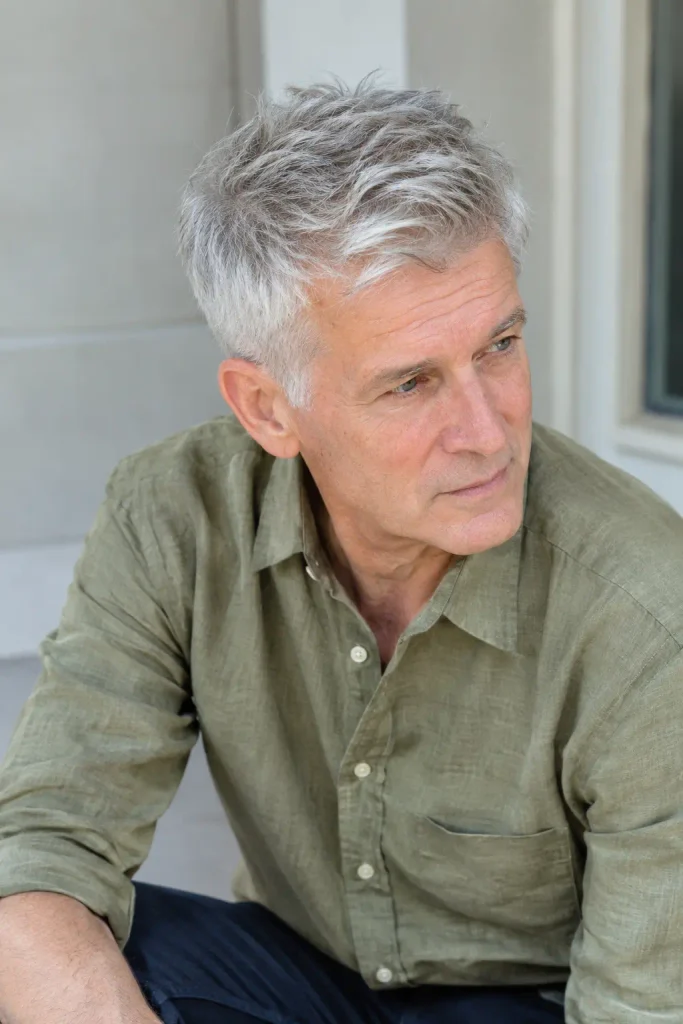 Fine-hair volumizing crop among practical Hairstyles for Men Over 60.
