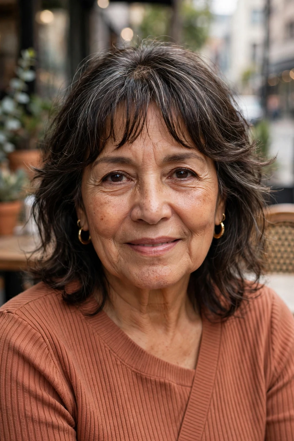 Beautiful older woman with bottleneck bangs, trendy bottleneck bangs, modern light.