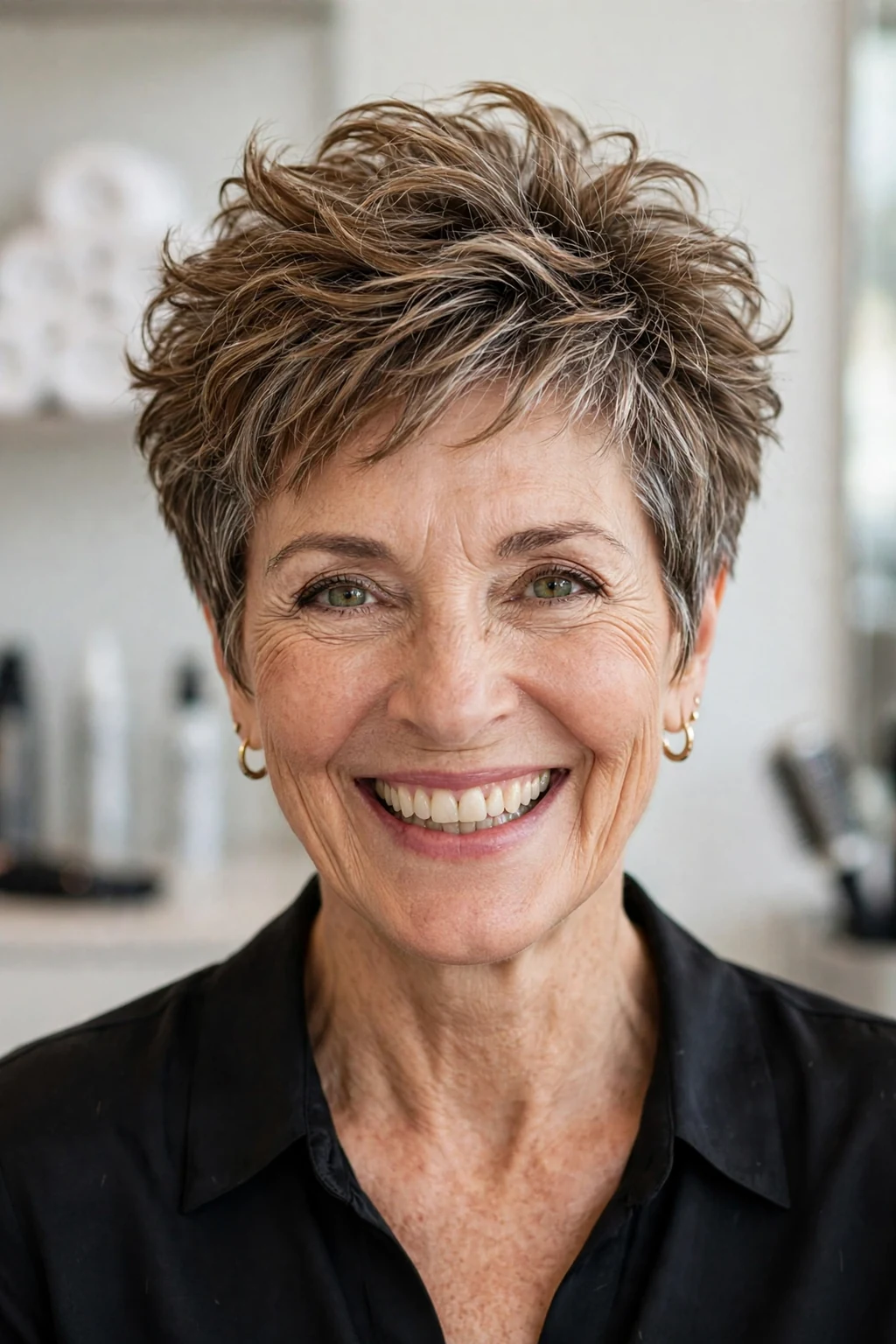Elegant woman over 50 with bouncy pixie, lively full texture, joyful light.