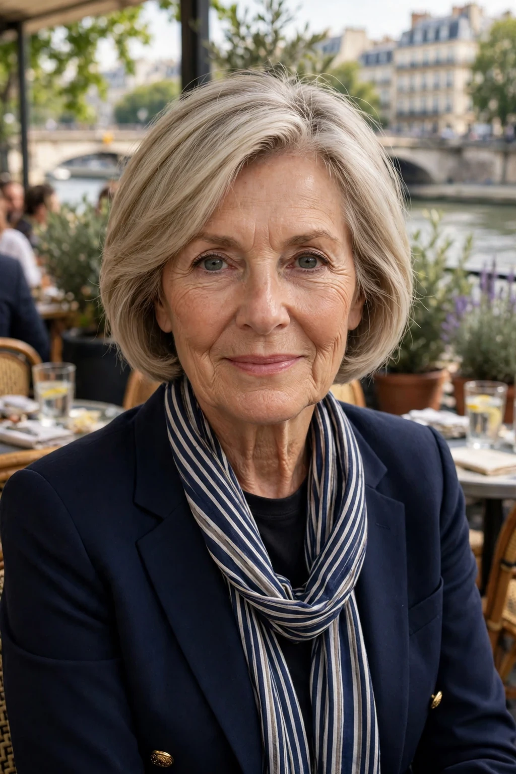 Mature woman with a chin-length stacked bob short haircut for fine hair, styled with soft volume.